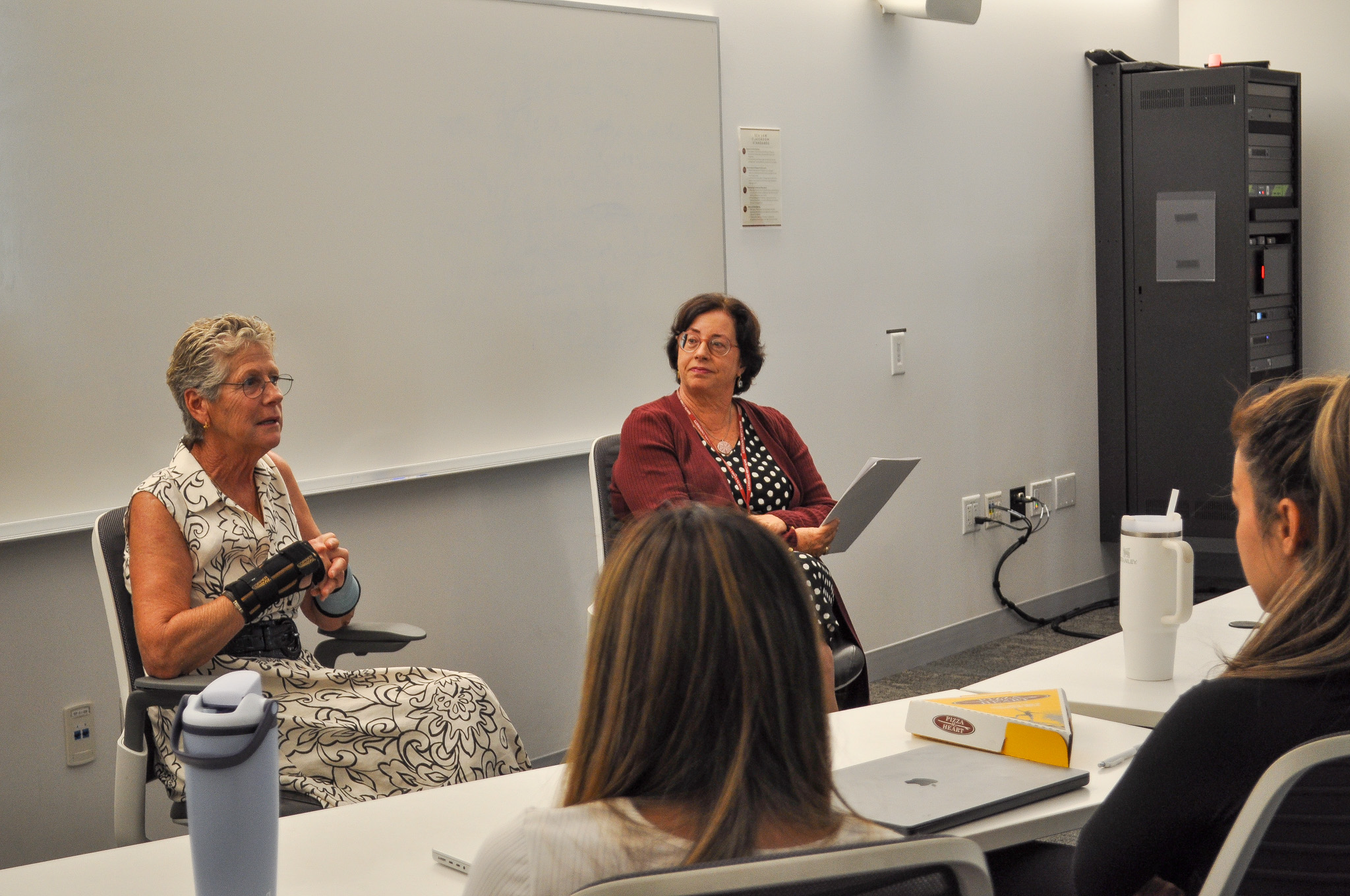 Dorian Daley and Lisa Kloppenberg speak to a class.