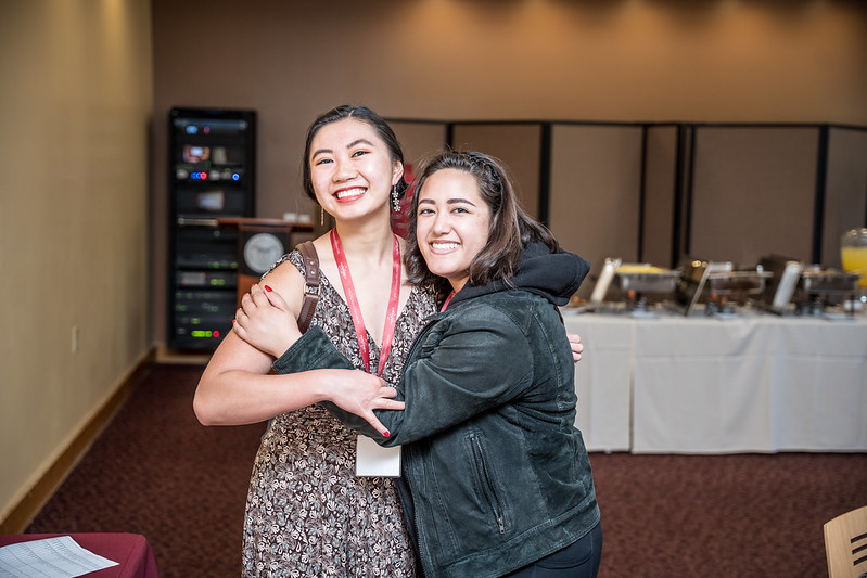 Two girls hugging