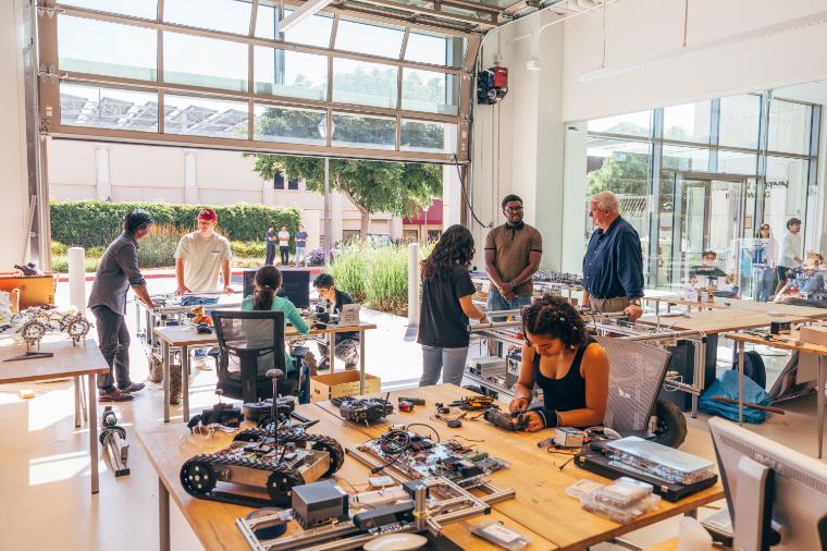 Students and faculty collaborating in the Robotics Systems Lab