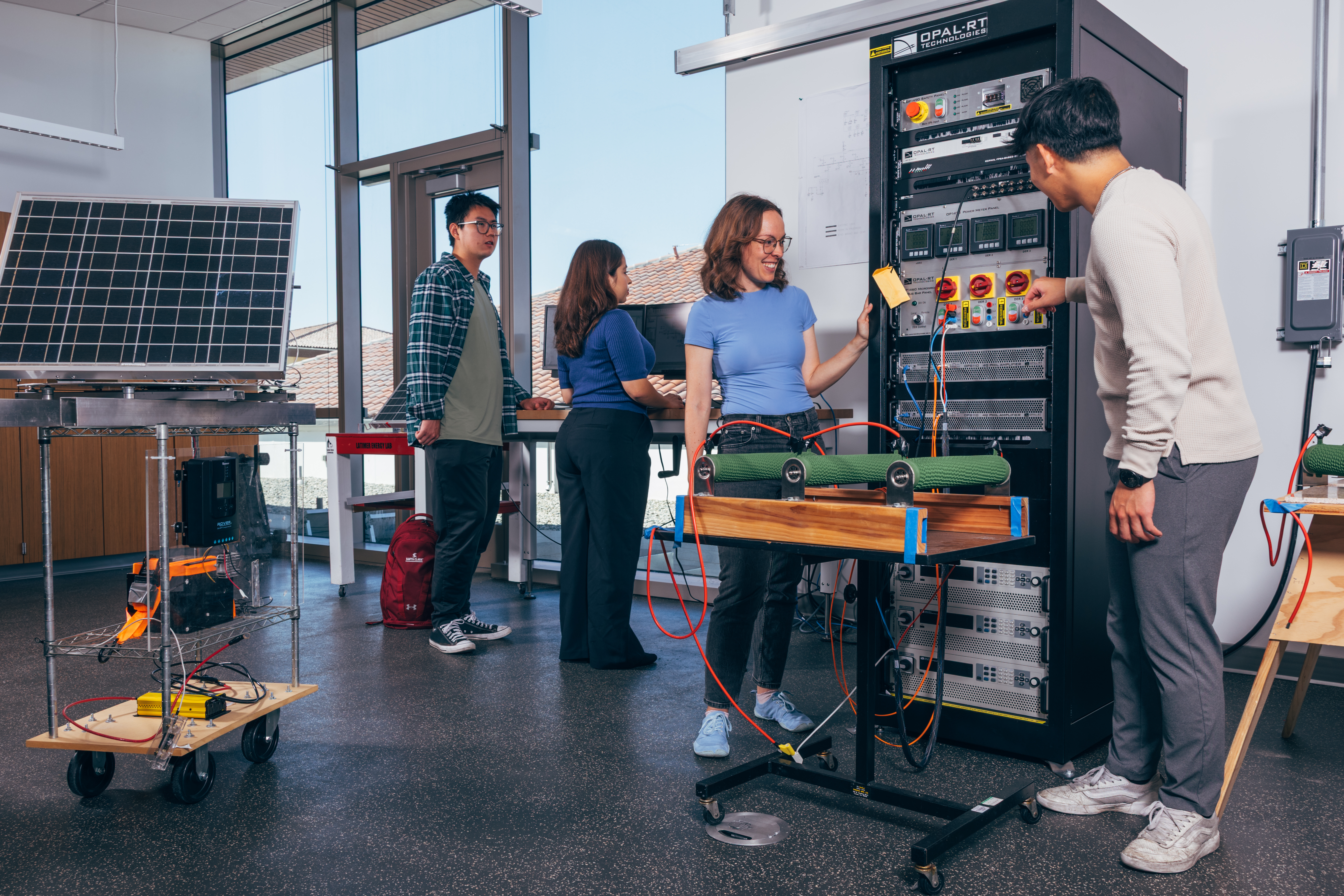 Students collaborating in the Power Systems Lab