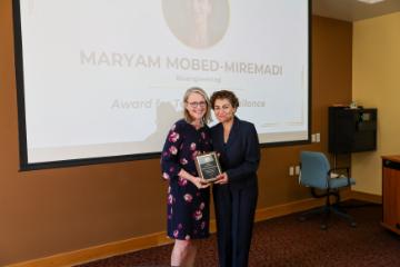 Dr. Mobed-Miremadi receiving teaching excellence award